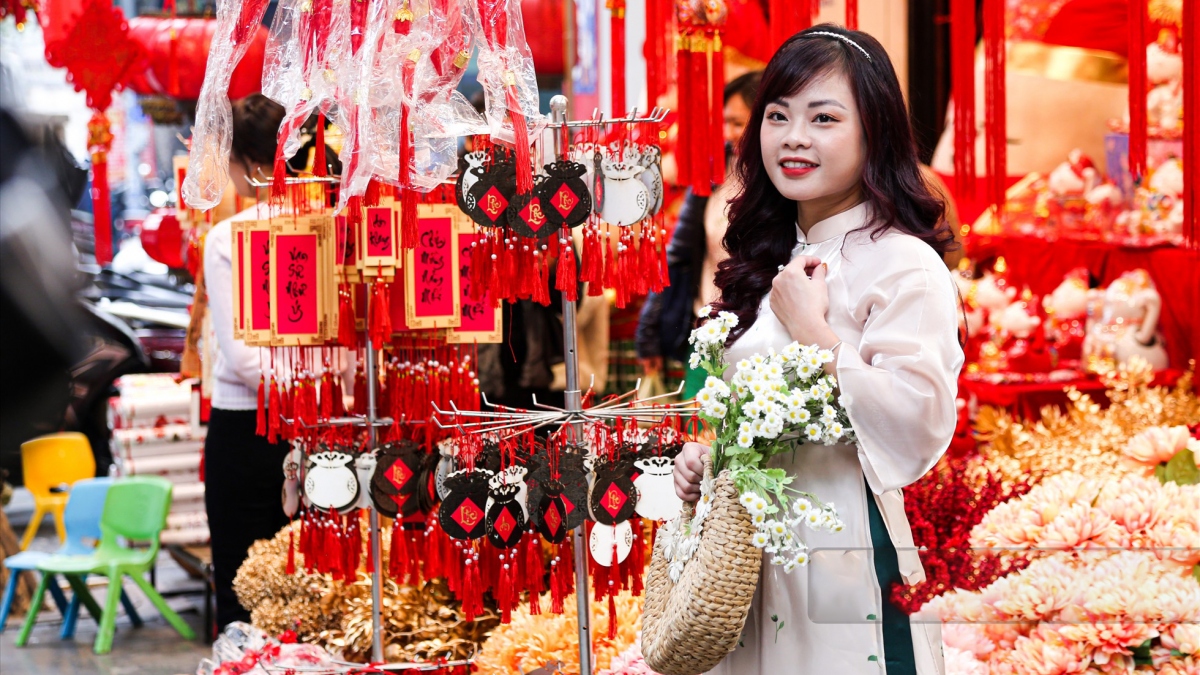 Hang Ma street decked out in red for Tet celebrations after Christmas